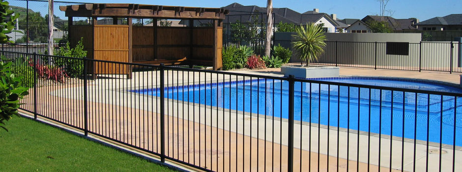 pool with iron fence