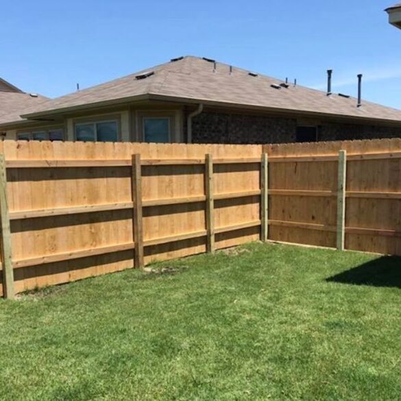 residential wooden fence installation for perimeter line and privacy.